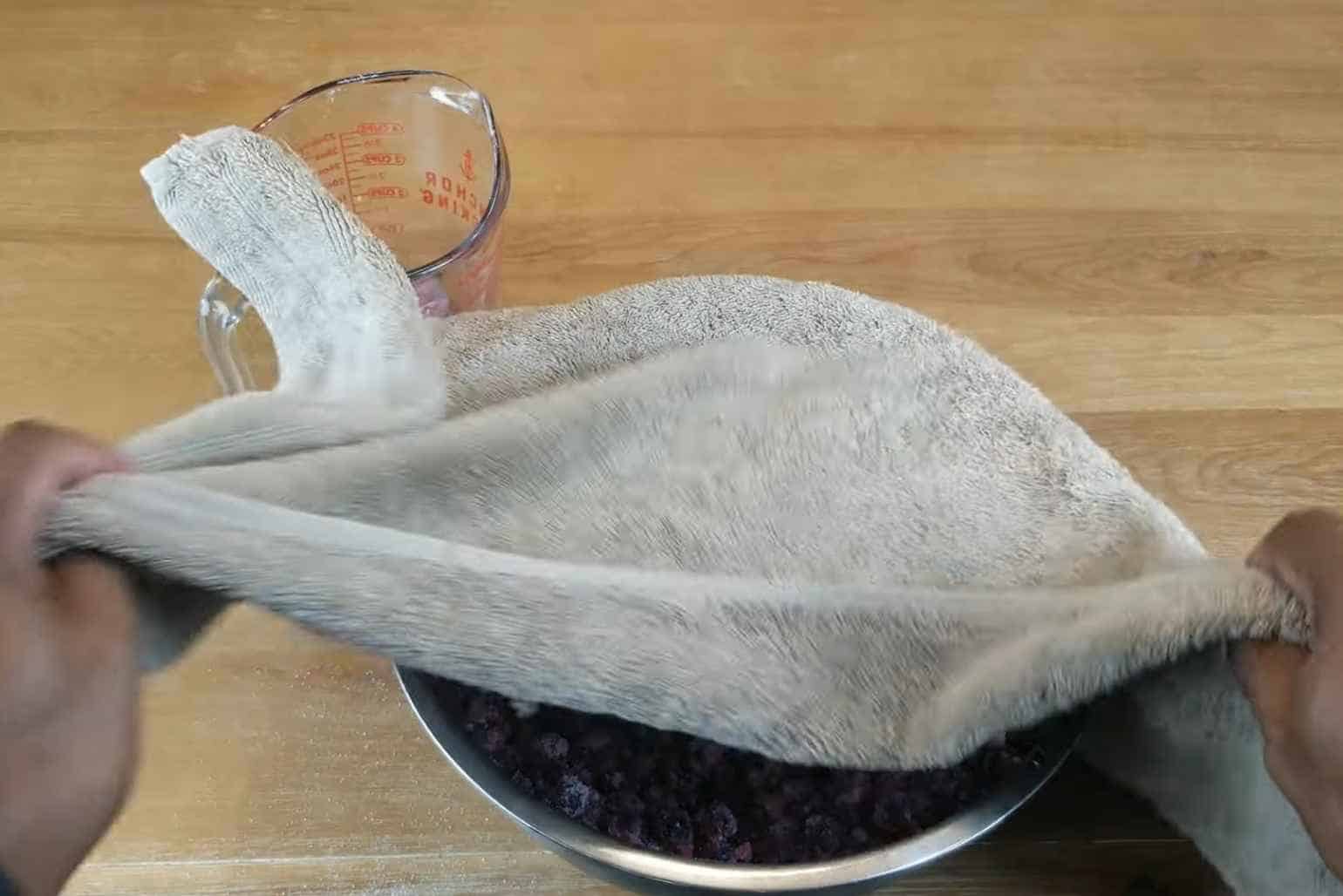 After doing so, cover the mixed sugar and blueberries with a piece of cloth and let it sit for a couple of hours to let the blueberries absorb the sugar well.