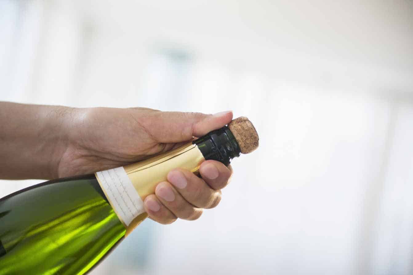 Secure Your Thumb Over the Cork